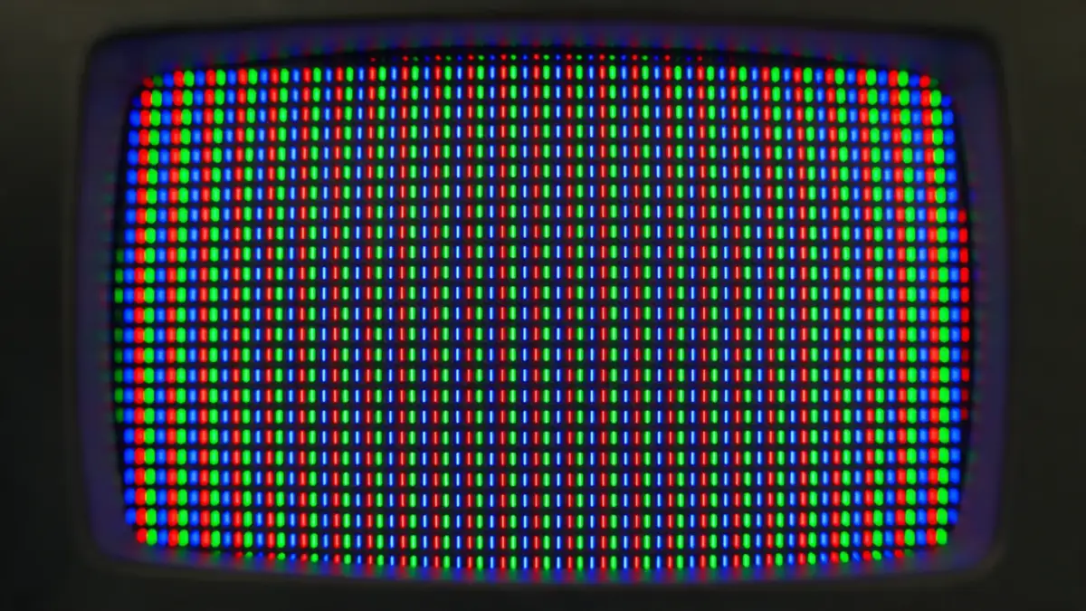 Macro view of glowing red, green and blue TV subpixels